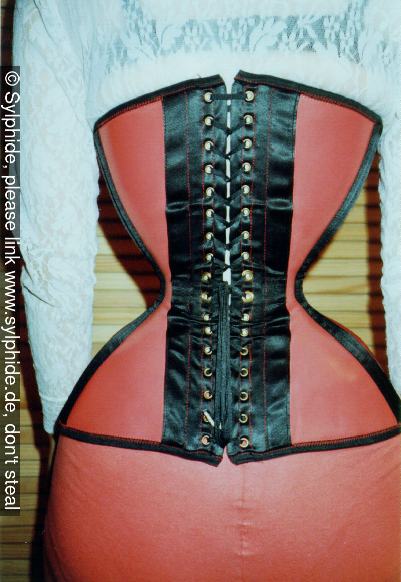 Red elastic corset 17 inch tightlaced to wasp waist (back) Sylphide figure training tight lacing corset laced wasp waist tightlaced
