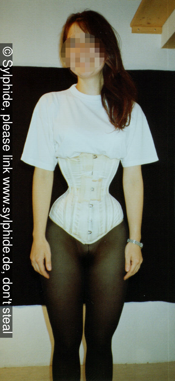 Satin corset 19 inch tightlaced to wasp waist T-shirt and tights, looks very erotic (front) Sylphide figure training tight lacing corset laced wasp waist tightlaced