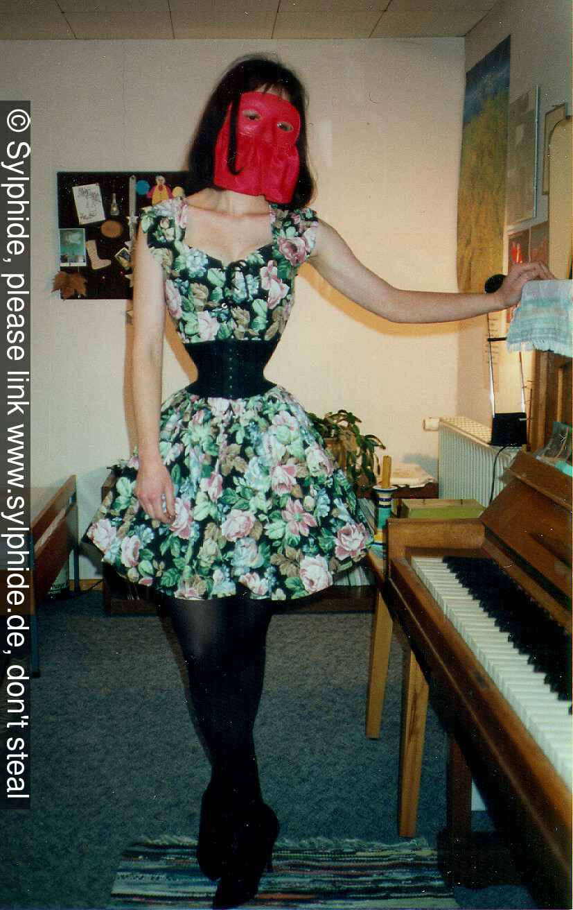 Tight 17 inch corset tightlaced to wasp waist under dainty summer dress at piano Sylphide figure training tight lacing corset laced wasp waist tightlaced